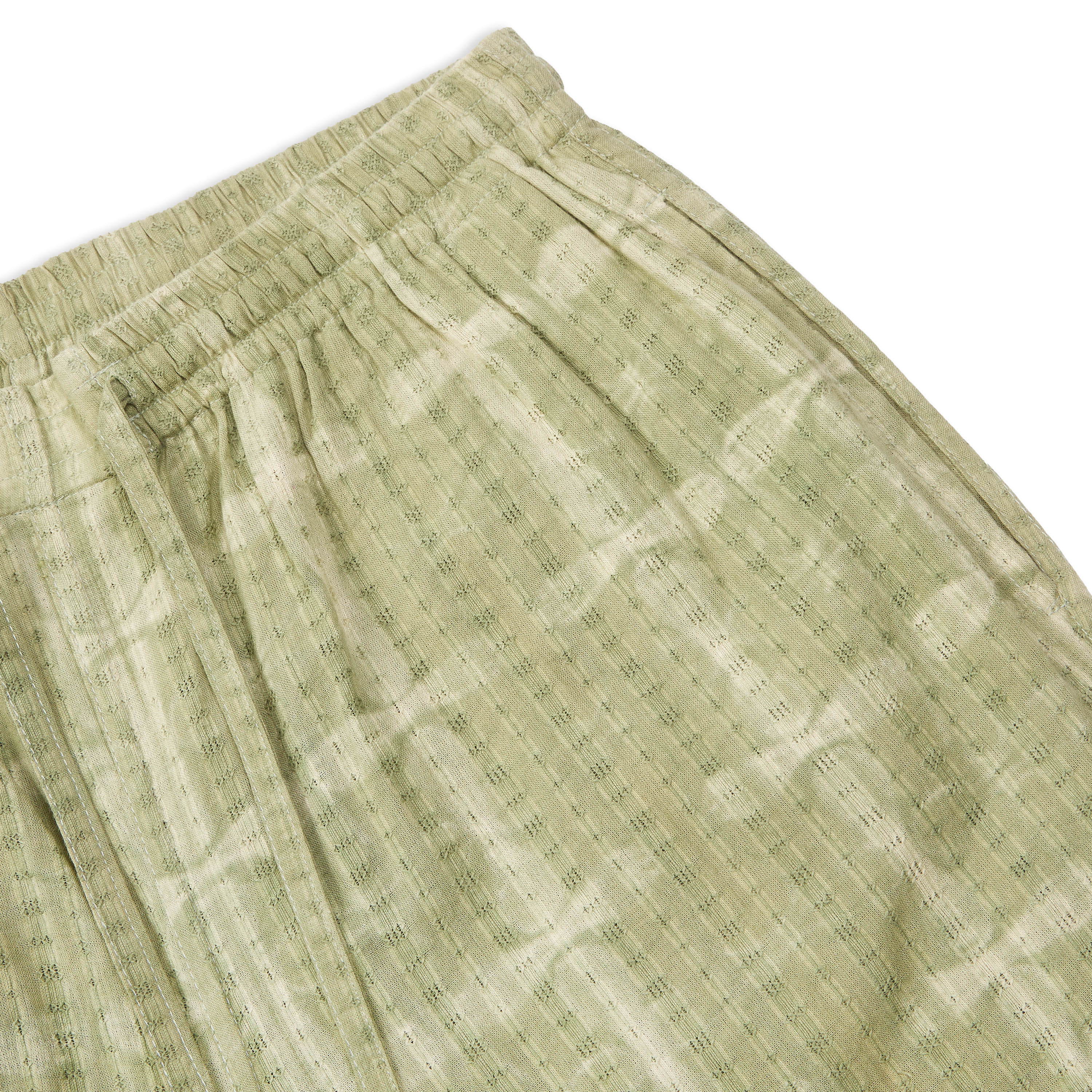 Side view of Kardo Olbia Drawstring Shorts in Shibori Mint, 100% cotton.