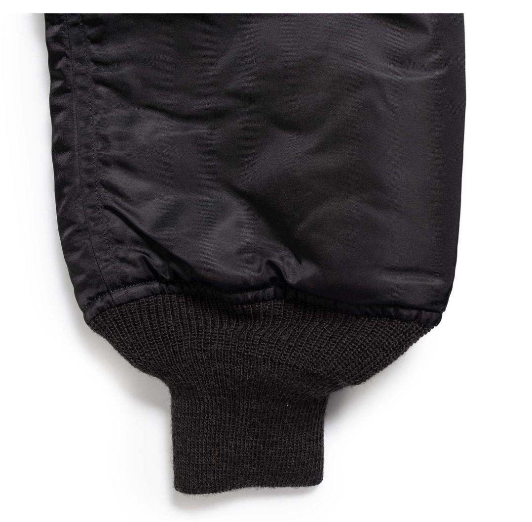 Black MA-1 Albert Turner & Co Model by Buzz Rickson's, zip front design.
