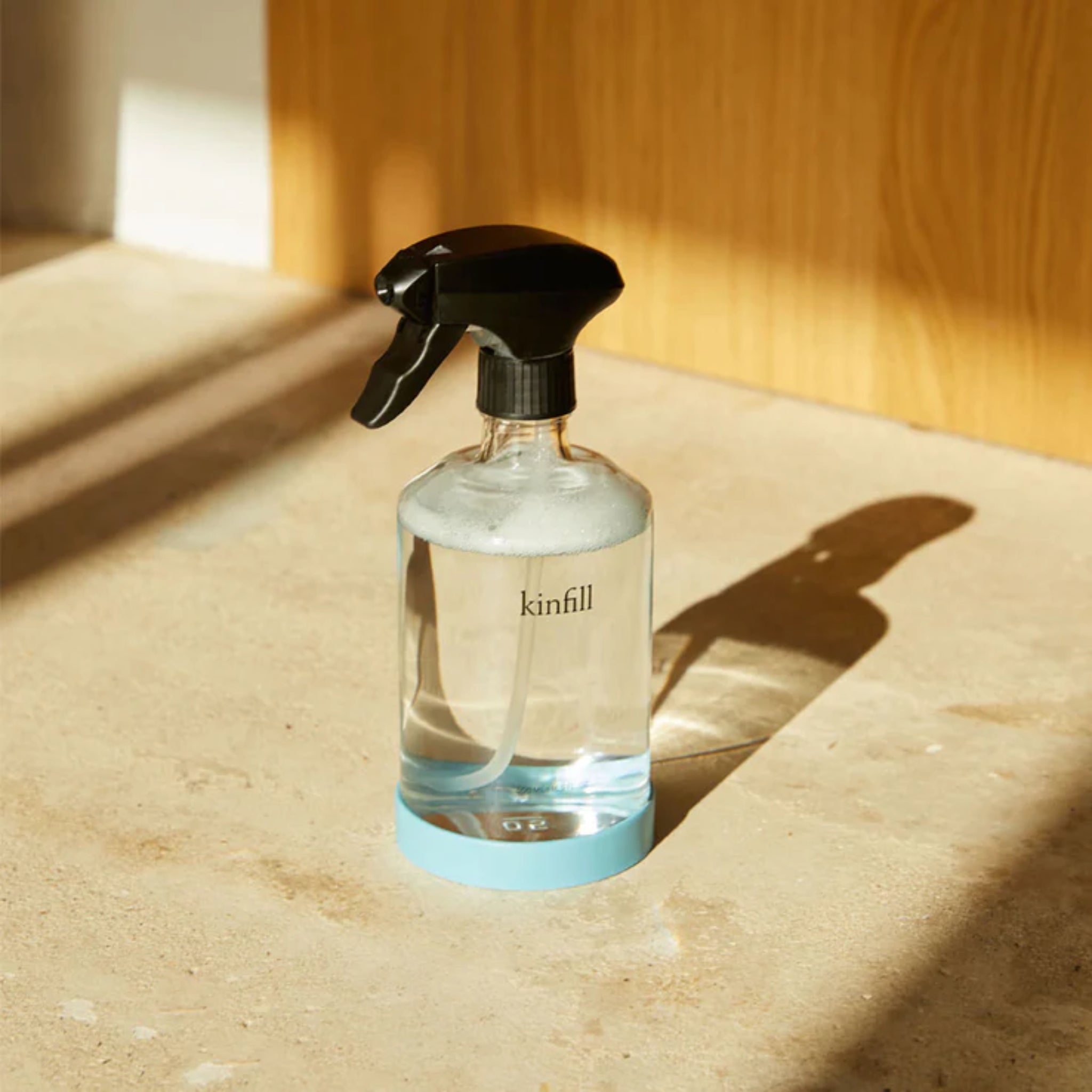 Stylish Kinfill Kitchen Cleaner Kit in Pine Husk, featuring glass spray bottle and concentrated refills.