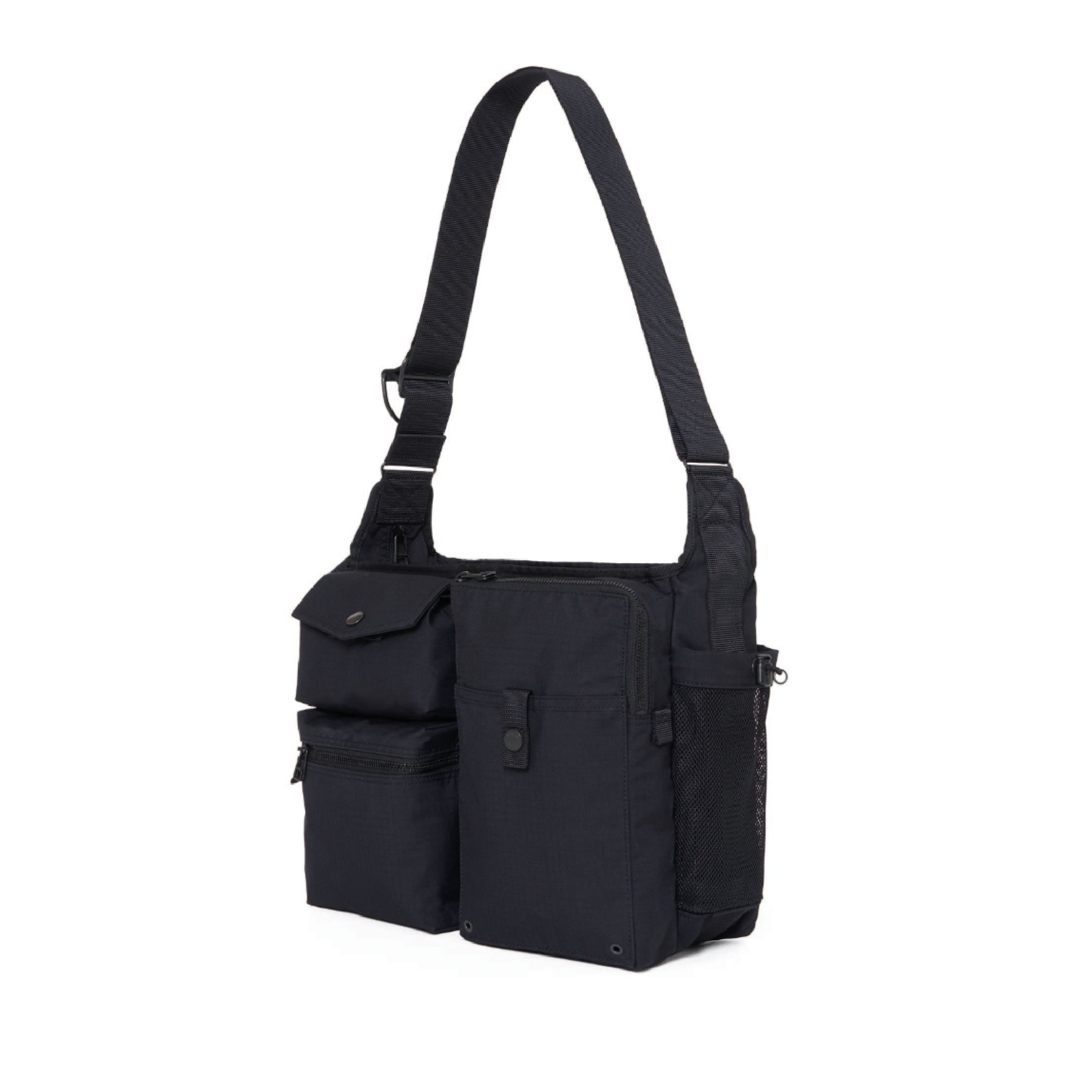 POTR / Porter Yoshida & Co. Dissection Shoulder Bag in black — front pocket detail showing utility compartments and zip pull